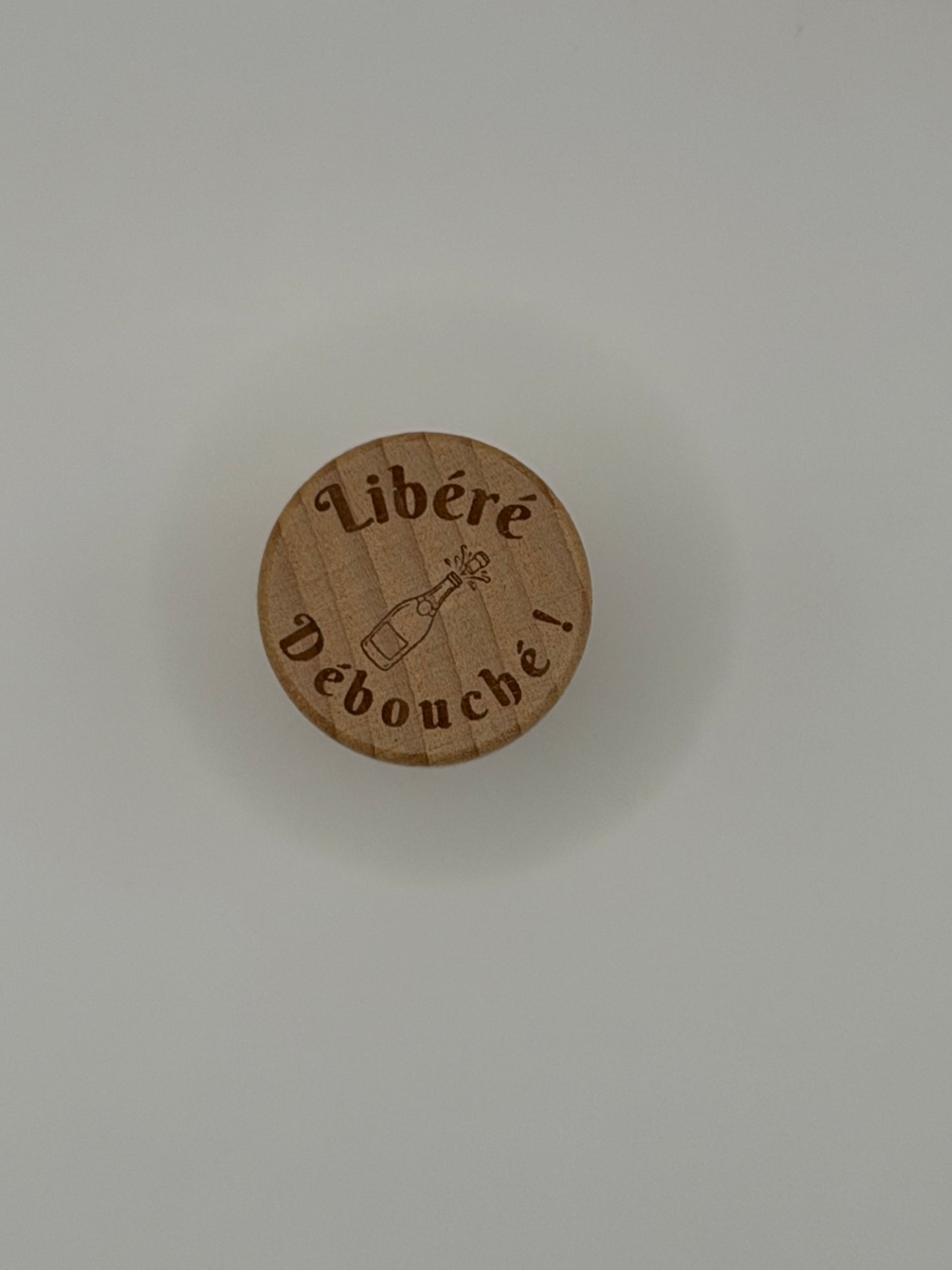 Bouchon de bouteille gravé