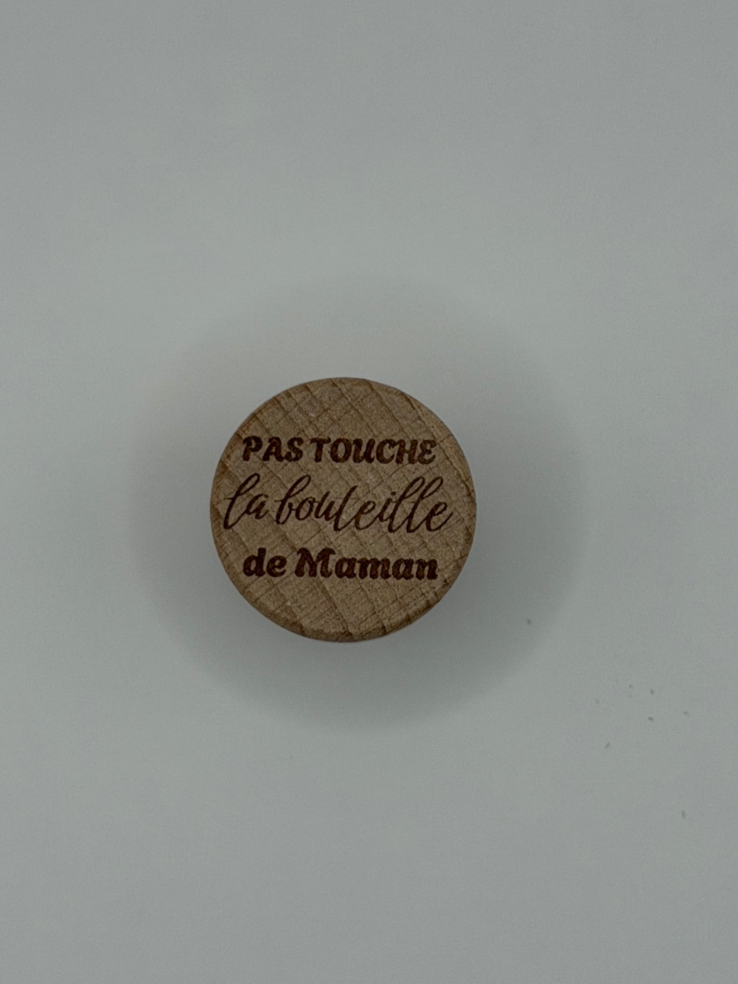 Bouchon de bouteille gravé